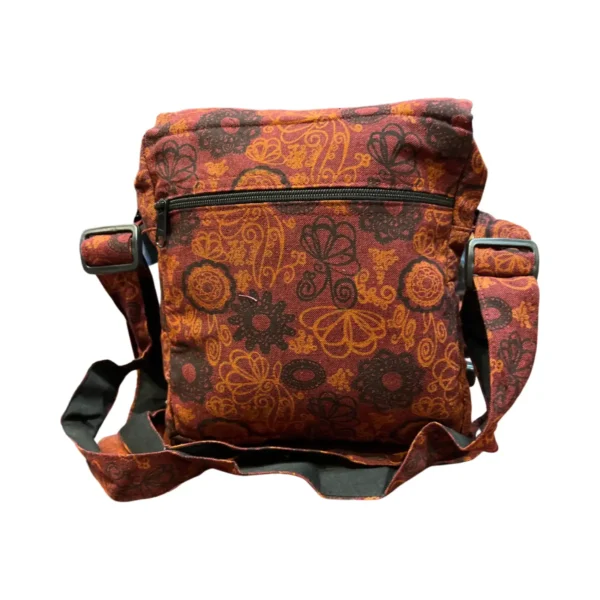 Sac à motifs floraux marron et orange, élégant et coloré, parfait pour ajouter une touche de style à toute tenue.