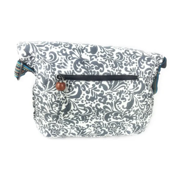 Un sac à dos blanc et multicolore orné d'un motif floral.